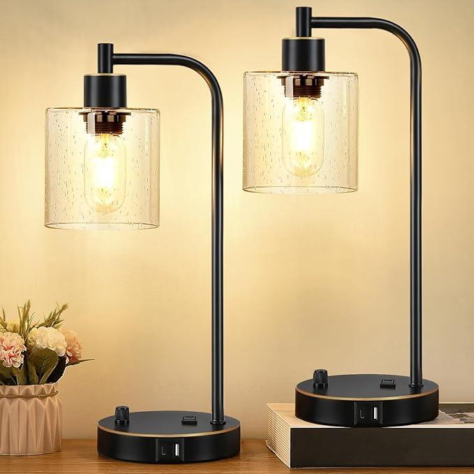 "Set van 2 dimbare industriële tafellampen met USB-poorten, mat zwarte basis en heldere glazen kap, modern ontwerp"