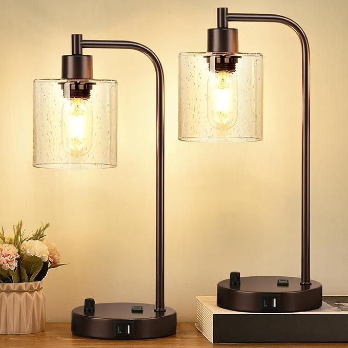 "Set van 2 dimbare industriële tafellampen met USB-poorten, mat zwarte basis en heldere glazen kap, modern ontwerp"
