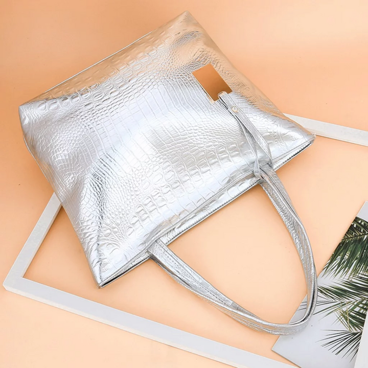 Stijlvolle dames schoudertas met krokodillenprint, perfect voor elke elegante outfit.