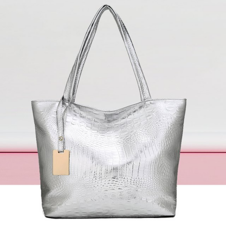 Modieuze dames schoudertas met elegante krokodillenprint textuur. Een trendy accessoire.