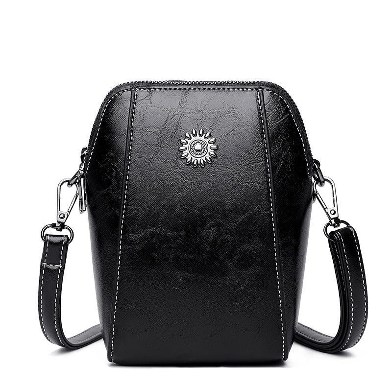 Moderne leren dames schoudertas, een stijlvolle mini tas die elegantie toevoegt aan elke outfit.