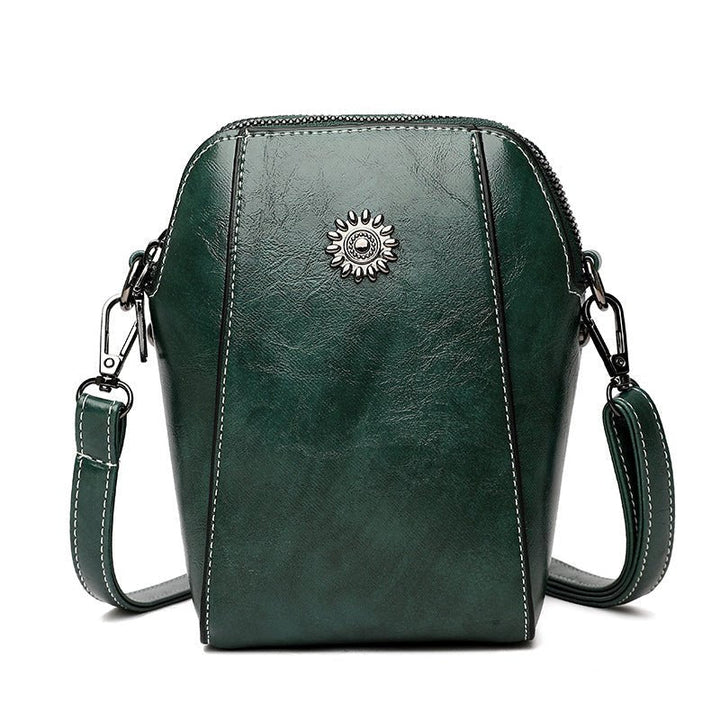 Stijlvolle dames mini tas, perfect voor avondjes uit, deze compacte leren schoudertas straalt elegantie uit.