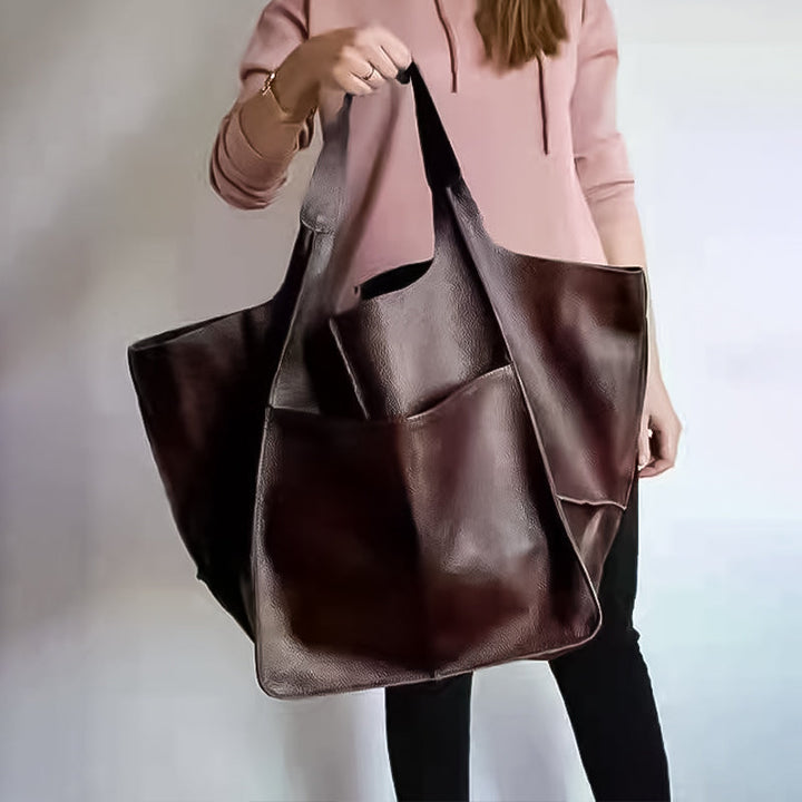 Modieuze vintage handtas voor dames, ruime inhoud, comfortabel over schouder te dragen.