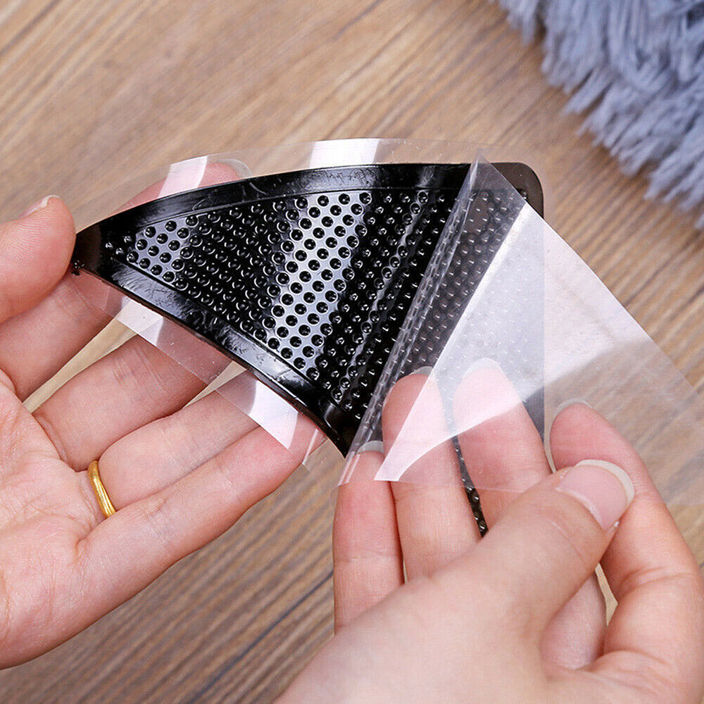 Zwarte antislip pads voor stabiliteit van vloerkleden. Voorkom verschuivende matten, verhoog comfort thuis.