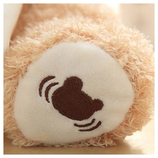 Kinderen spelen verstoppertje met deze interactieve pluche teddybeer, een zingende knuffel voor veel plezier.