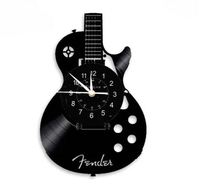 Unieke gitaar wandklok in zwart, ideaal als muziek decoratie. Trendy klok accessoire voor interieur of cadeau.