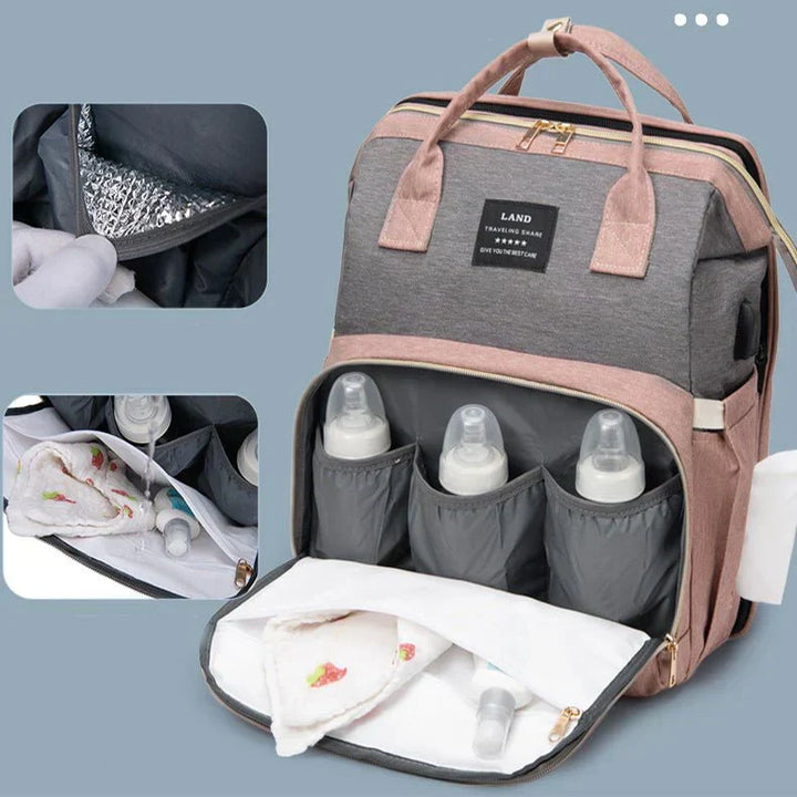 Compacte, waterafstotende verzorgingstas die uitklapt tot een comfortabel baby reisbedje.