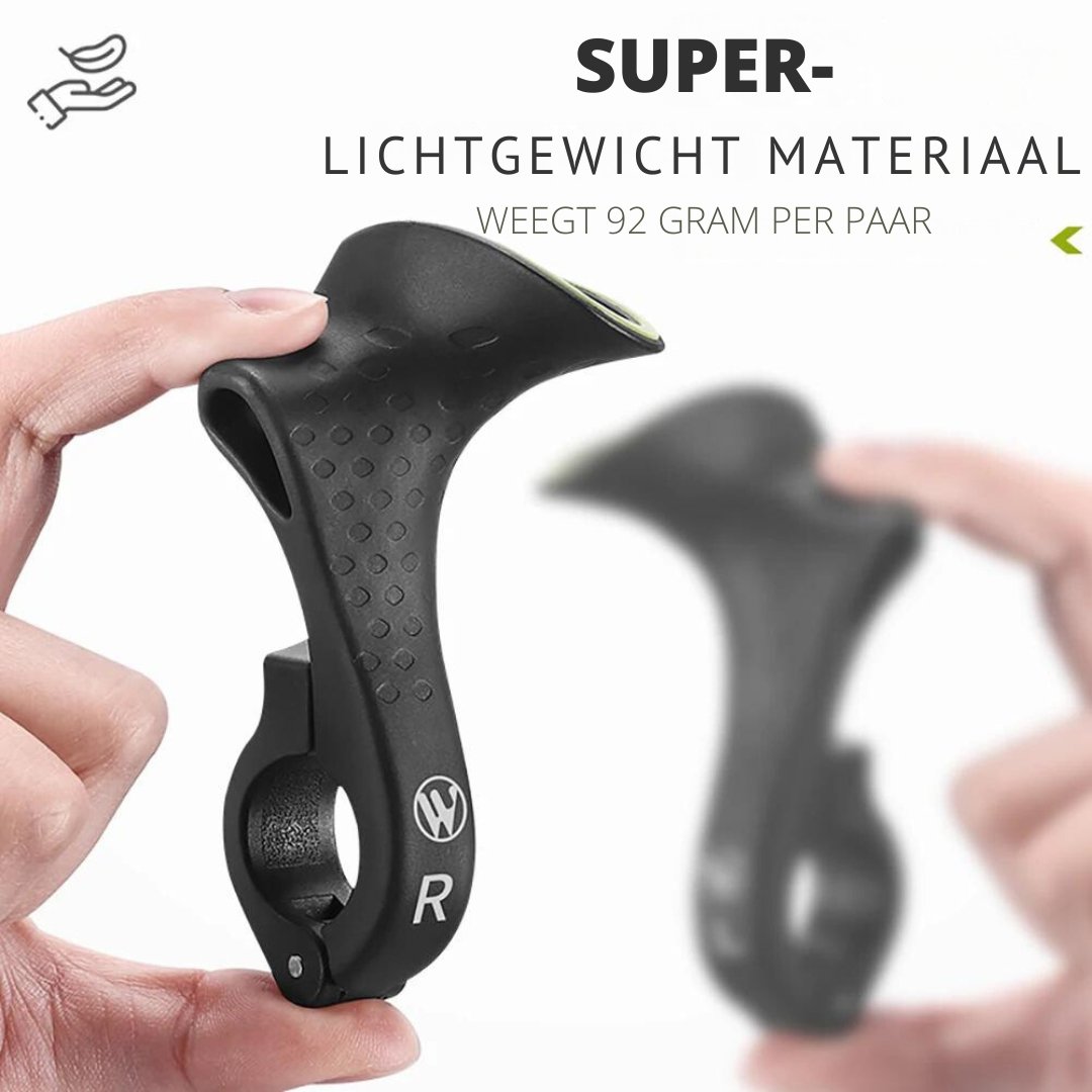 Detailopname van ergonomische fietsgrepen gemonteerd op een stuur, voor optimaal comfort en veilige grip, een must-have fietsaccessoire.
