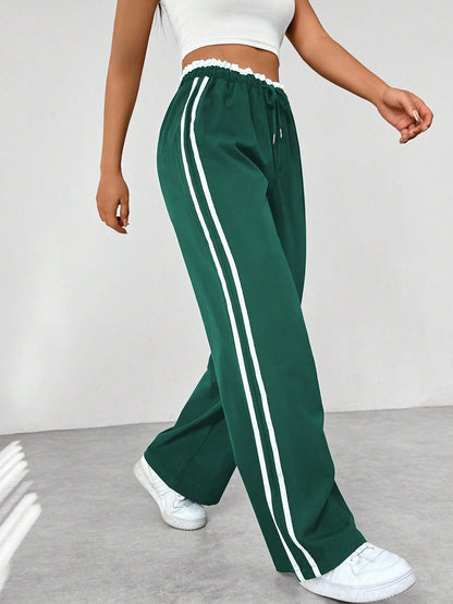 "Sportieve dames wide-leg broek, comfortabele pasvorm, elastische taille, trendy strepen, wijde pijpen, casual stijl"