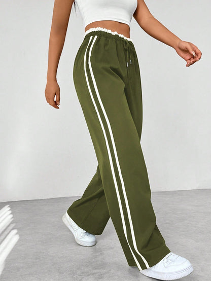 "Sportieve dames wide-leg broek, comfortabele pasvorm, elastische taille, trendy strepen, wijde pijpen, casual stijl"