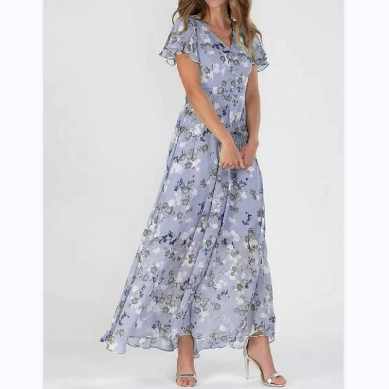 Chique damesjurk: lange zomerjurk met vrolijk bloemendessin, flatterende v-hals en elegante vlindermouwen.