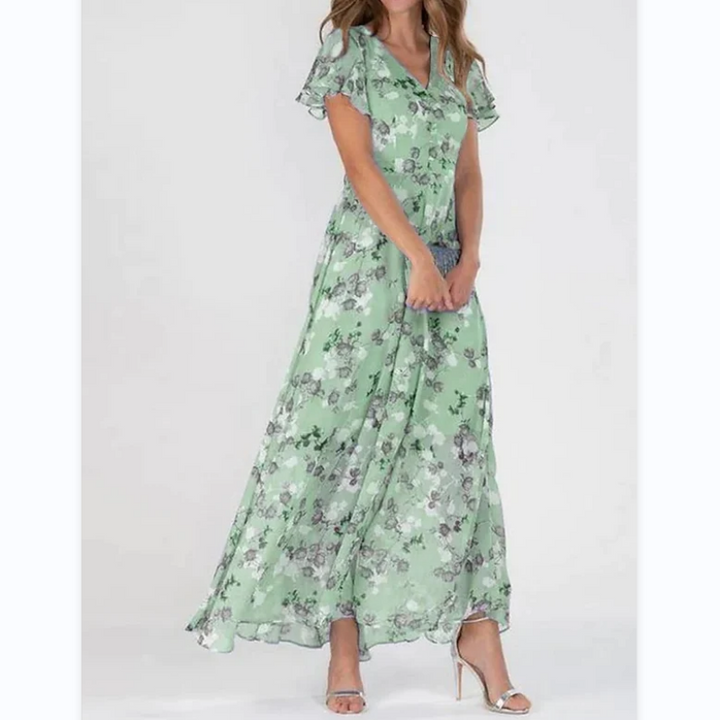 Elegante casual maxi-jurk voor dames met bloemprint, v-hals en vlindermouwen. Ideaal als vakantie- of zomerjurk.