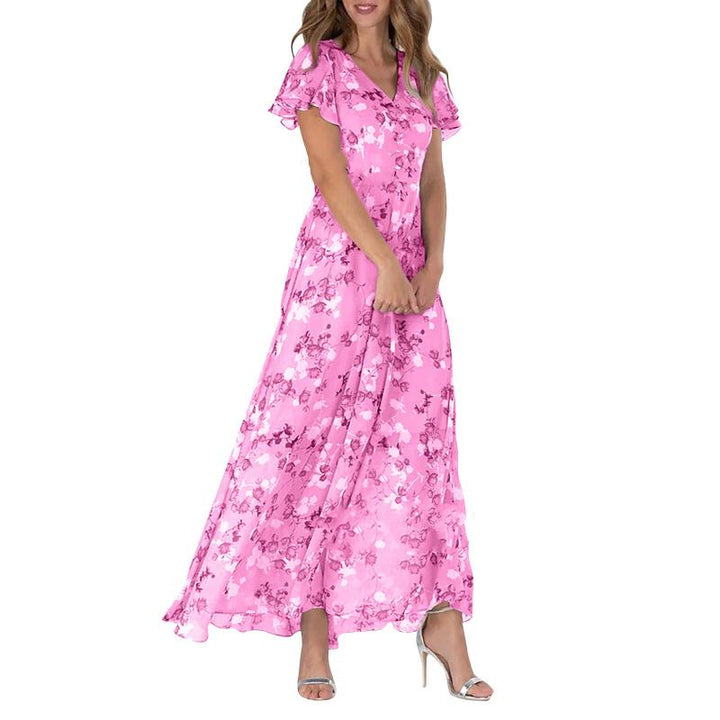 Nieuwe dames maxi-jurk met uniek bloemmotief, vlindermouwen en een stijlvolle v-hals. Comfortabele trendy jurk.
