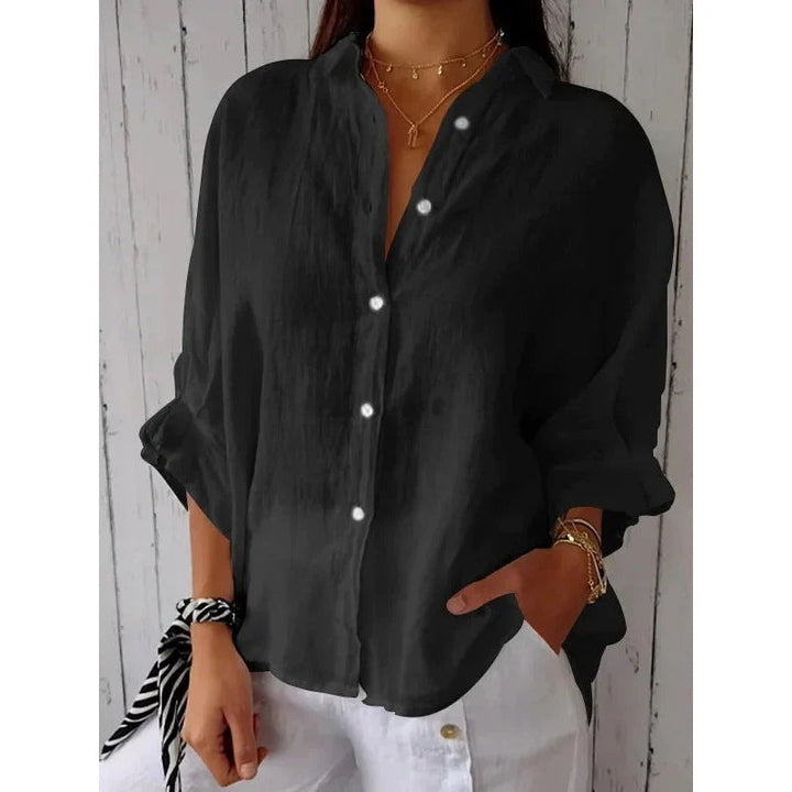 Zakelijke damesblouse met elegante V-hals en verstelbare oprolmouwen, veelzijdig voor werk en vrije tijd.
