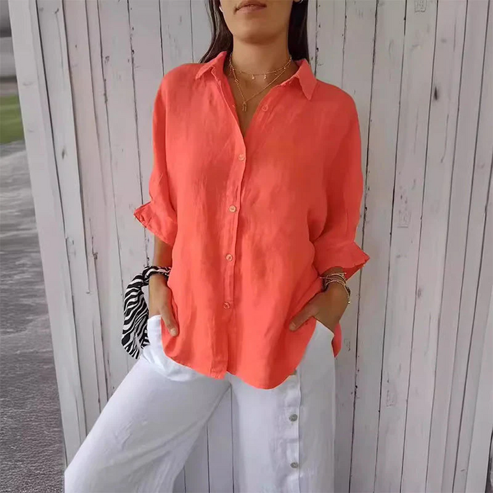 Dames elegante blouse met V-hals en oprolmouwen in effen kleur, perfect voor kantoor of casual look in de lente.