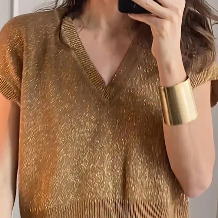 Trendy dames outfit: glanzende top en wijde broek set, creëert een moderne en feestelijke look met hoge taille.