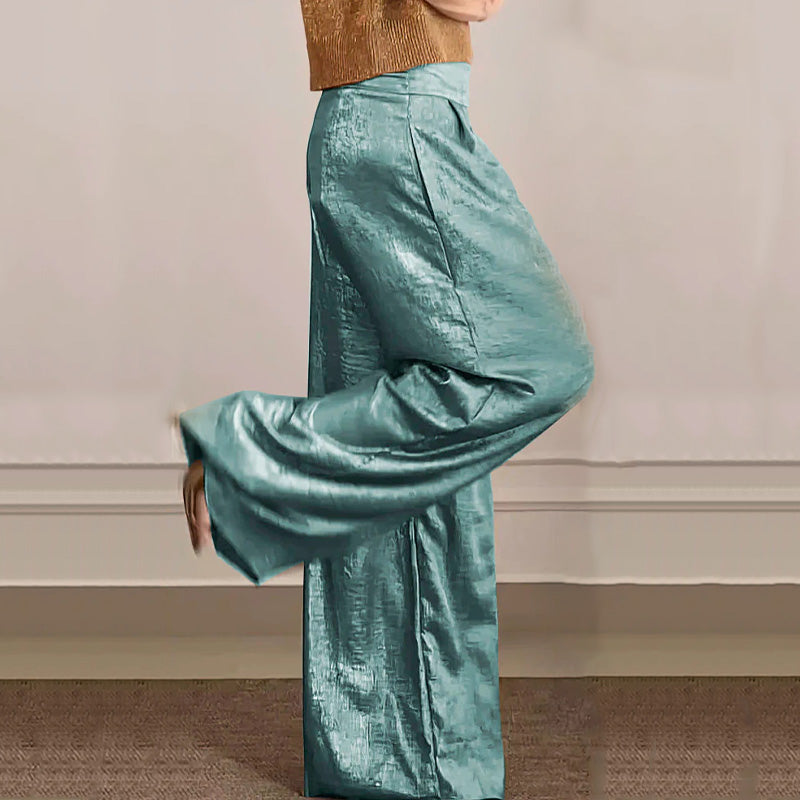 Elegante dames glanzende top, onderdeel van een tweedelige set met wijde broek, ideaal voor een feestelijke gelegenheid.