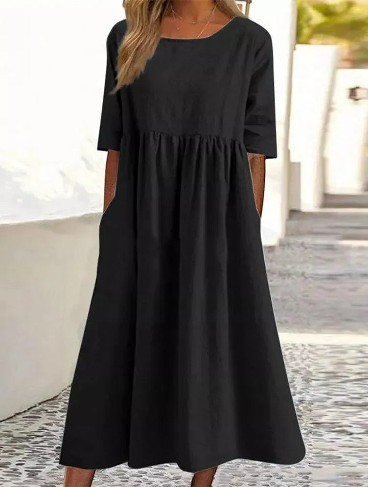 Comfortabele linnen dames zomerjurk met losse pasvorm, ademend en luchtig voor warm weer.