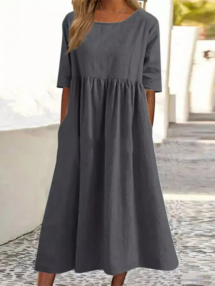 Luchtige linnen dames maxi jurk, comfortabel en casual voor zomerse dagen. Ideaal als strandjurk.
