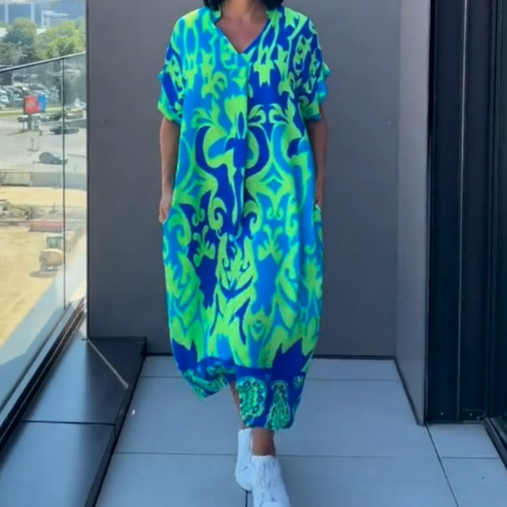 Dames kaftan midi jurk met unieke, stijlvolle print in zomerse kleuren, zeer luchtig en comfortabel.