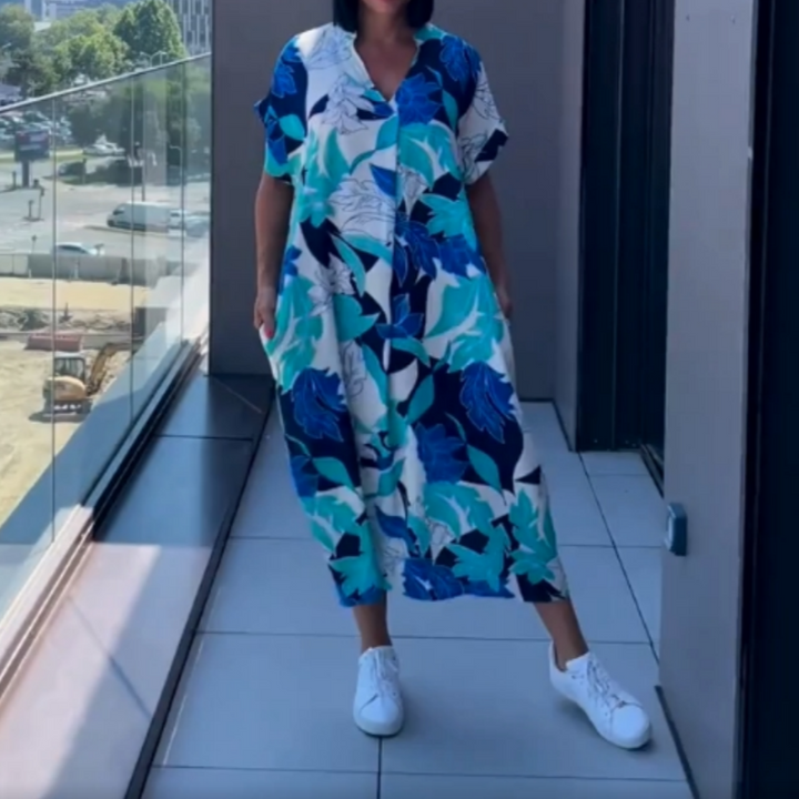 Trendy zomerjurk voor dames: luchtige kaftan midi jurk met vrolijke print, ideaal voor warme dagen.