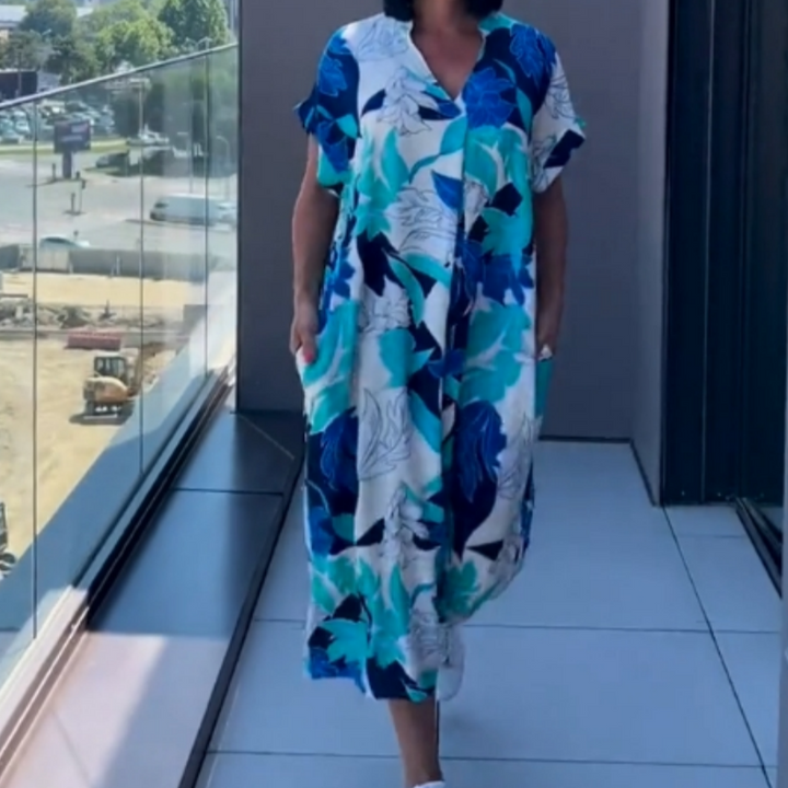 Comfortabele en luchtige dames kaftan midi jurk met stijlvolle print; perfect voor casual zomerkleding.