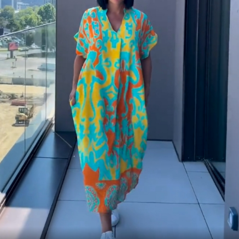 Veelzijdige dames kaftan midi jurk: luchtig, met elegante print, zowel casual als chic draagbaar in de zomer.