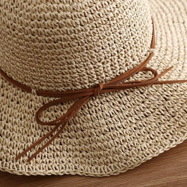 Tessa dames strandhoed (CARA) in beige, biedt UV-bescherming en is een stijlvol, ademend accessoire.