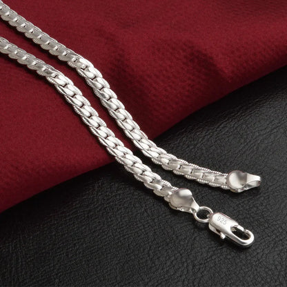 Sterling zilveren halsketting, tijdloze elegantie, glanzend 925 zilver, verfijnde afwerking, perfect voor elke gelegenheid.