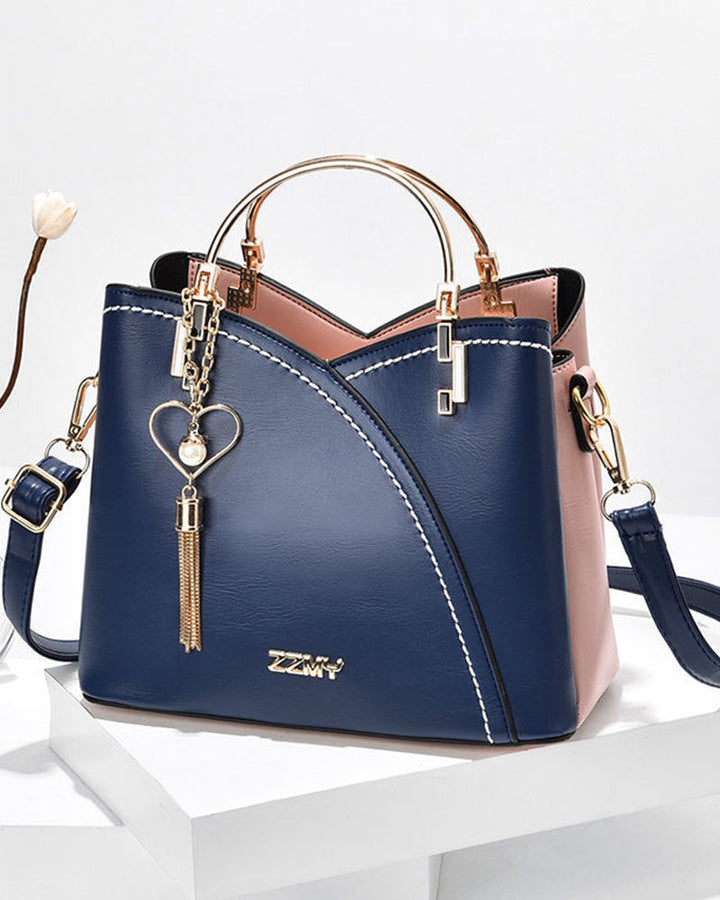 Stijlvolle dames handtas van hoogwaardig PU leer. Ruim, elegant en perfect voor dagelijks gebruik.