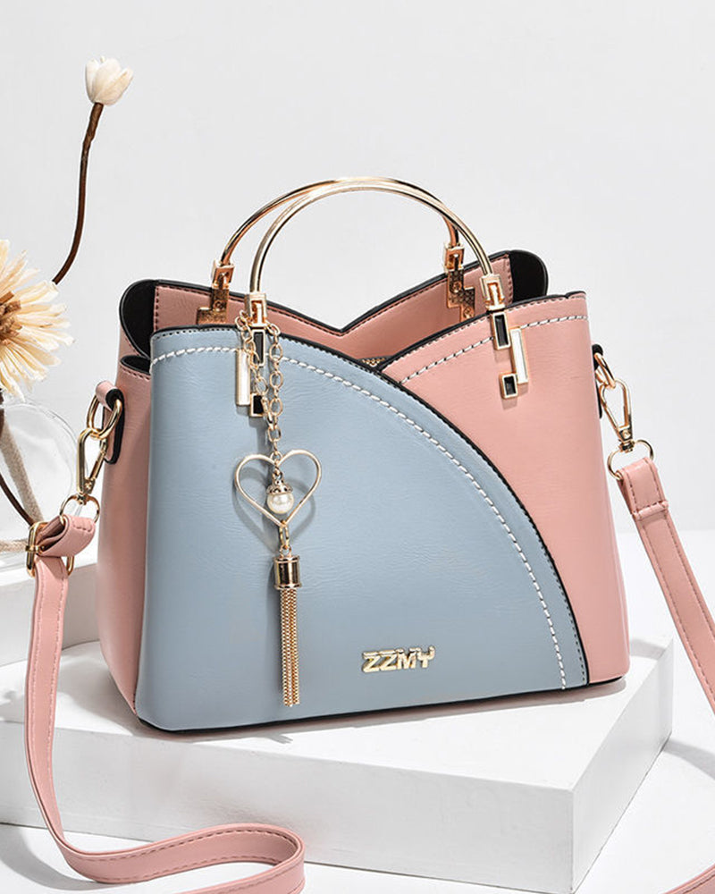 Elegant design van de PU leren handtas voor dames, met strakke lijnen en een tijdloze uitstraling.