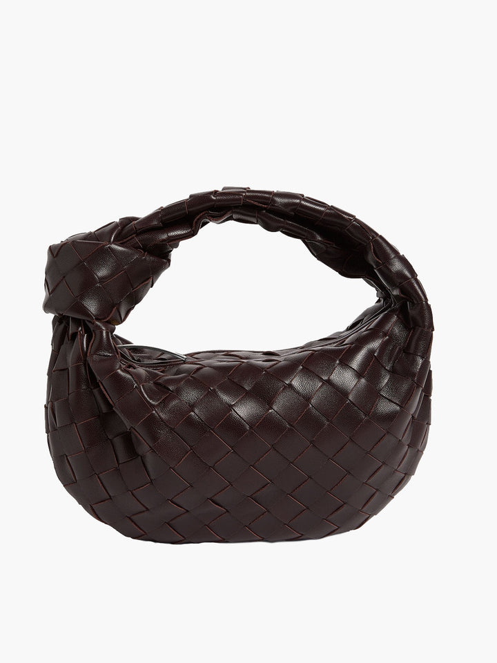 Trendy crossbody tas voor dames, gemaakt van duurzaam vegan leer met geweven structuur.