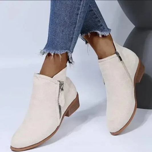 "Stijlvolle orthopedische enkelhoge dames boots met ritssluiting, beschikbaar in trendy kleuren voor maximaal comfort."