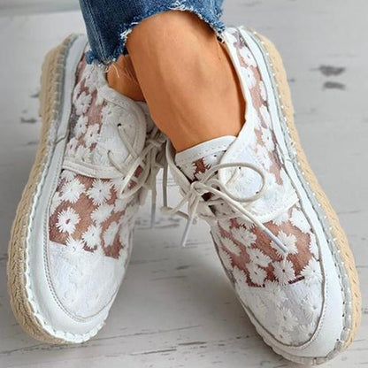 "Stijlvolle orthopedische sneakers met bloemmotief, luchtig design ideaal voor zomerse avonturen, hoogwaardige afwerking."