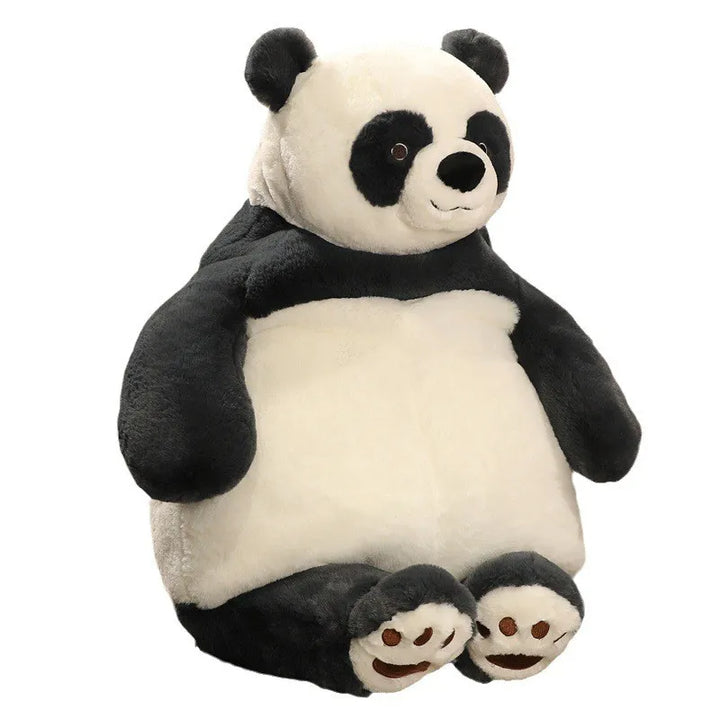 Lachend kind met verzwaarde knuffel; rustgevend speelgoed voor betere concentratie en sensorische prikkels.