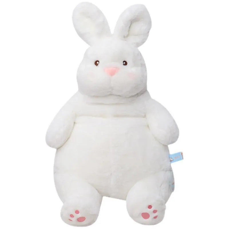 Een kind leest rustig met een verzwaarde SnuggleBuddy knuffel; bevordert focus en ontspanning.