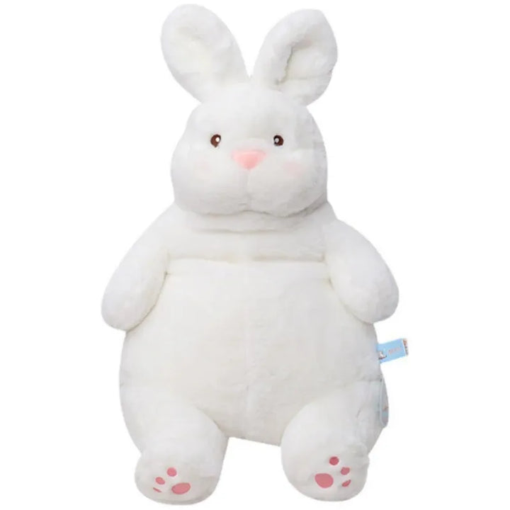 Een kind leest rustig met een verzwaarde SnuggleBuddy knuffel; bevordert focus en ontspanning.
