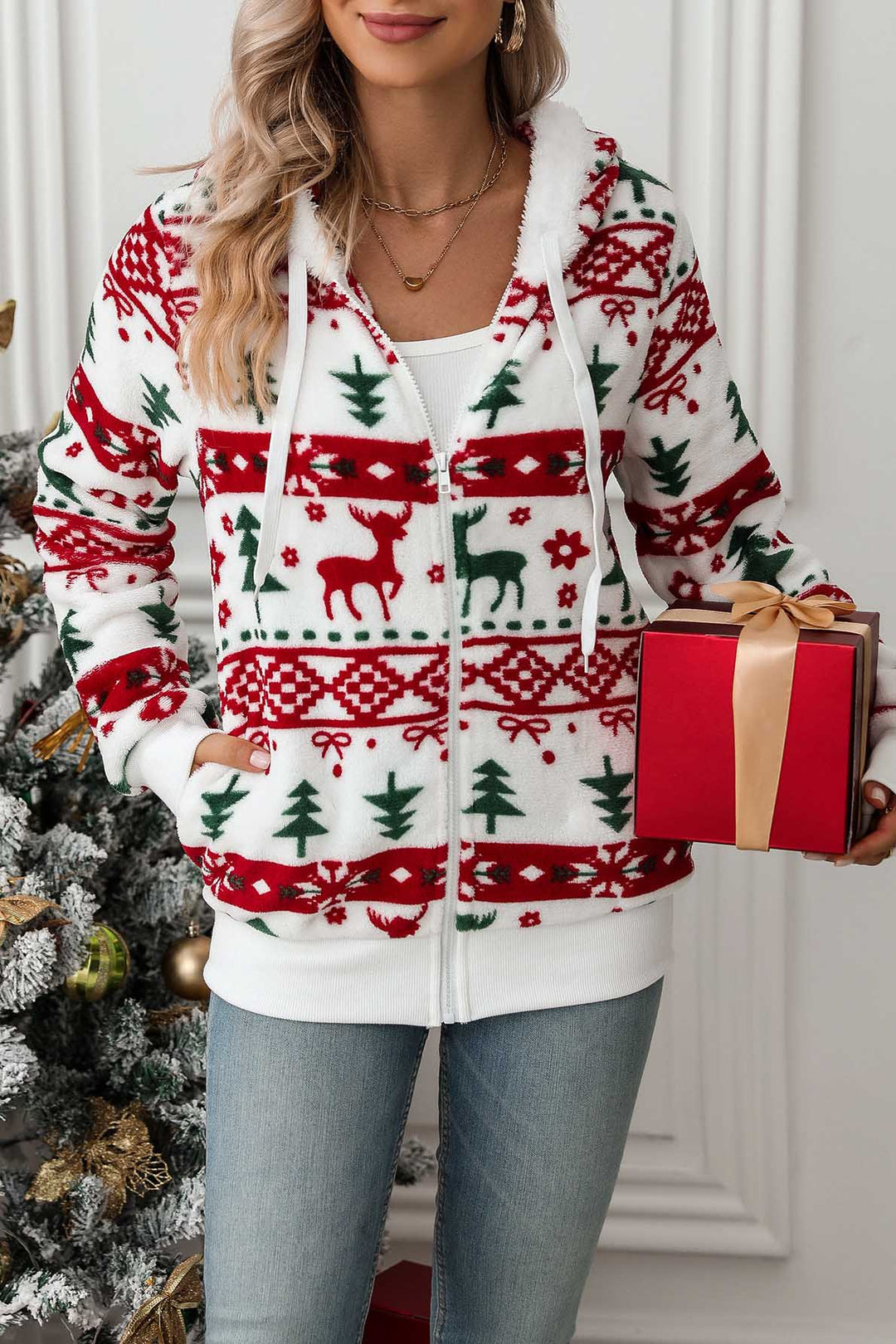 Dames kersthoodie met rits, capuchon en rendierprint. Perfect voor feestelijk comfort in de winter.