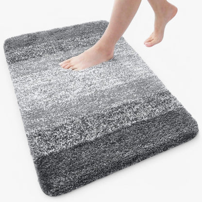"Super absorberende antislip badmat met sneldrogende microvezels, zacht blauw oppervlak, ideaal voor badkamercomfort."