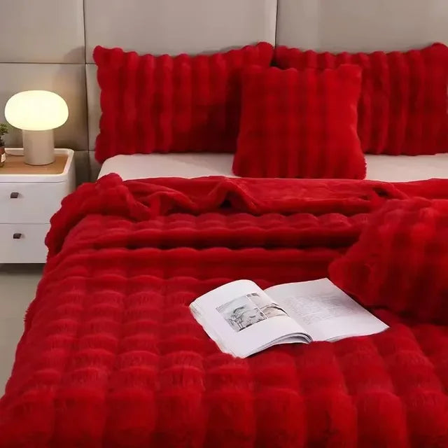 "Superzachte imitatiebont deken in warme tinten, ideale winterdeken voor bed of bank, biedt luxe comfort en stijl."