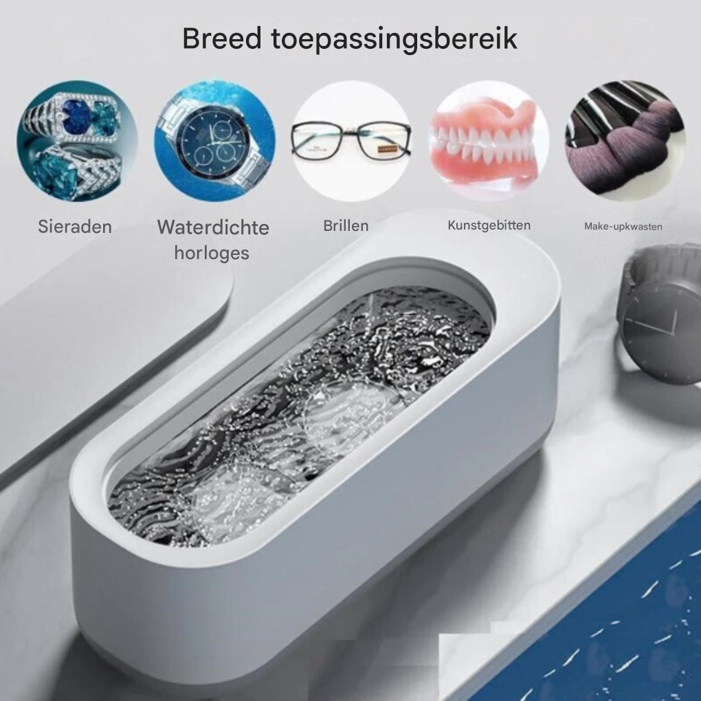Compacte ultrasoon reiniger die brillen en sieraden grondig schoonmaakt, voor sprankelende resultaten.