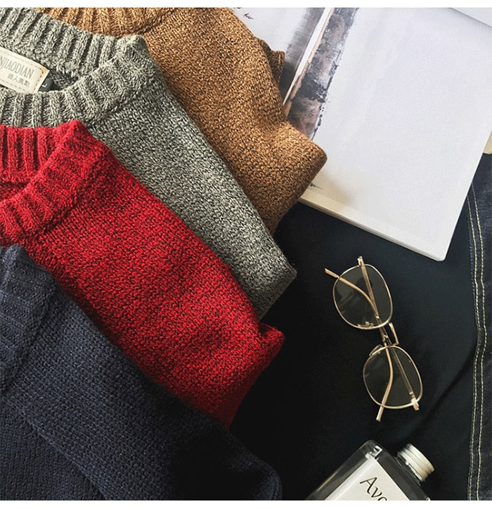 Stijlvolle heren wintertrui met ronde hals en trendy elleboogpatches, ideaal voor casual mode.