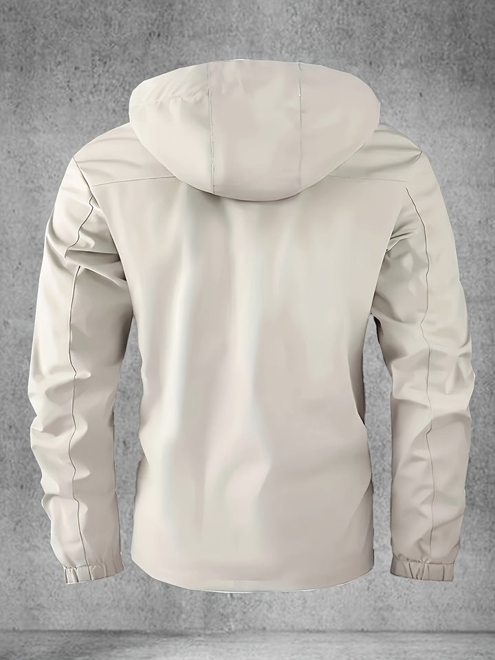 Hoogwaardige waterdichte softshell herenjas met capuchon, essentiële bovenkleding voor outdoorliefhebbers.