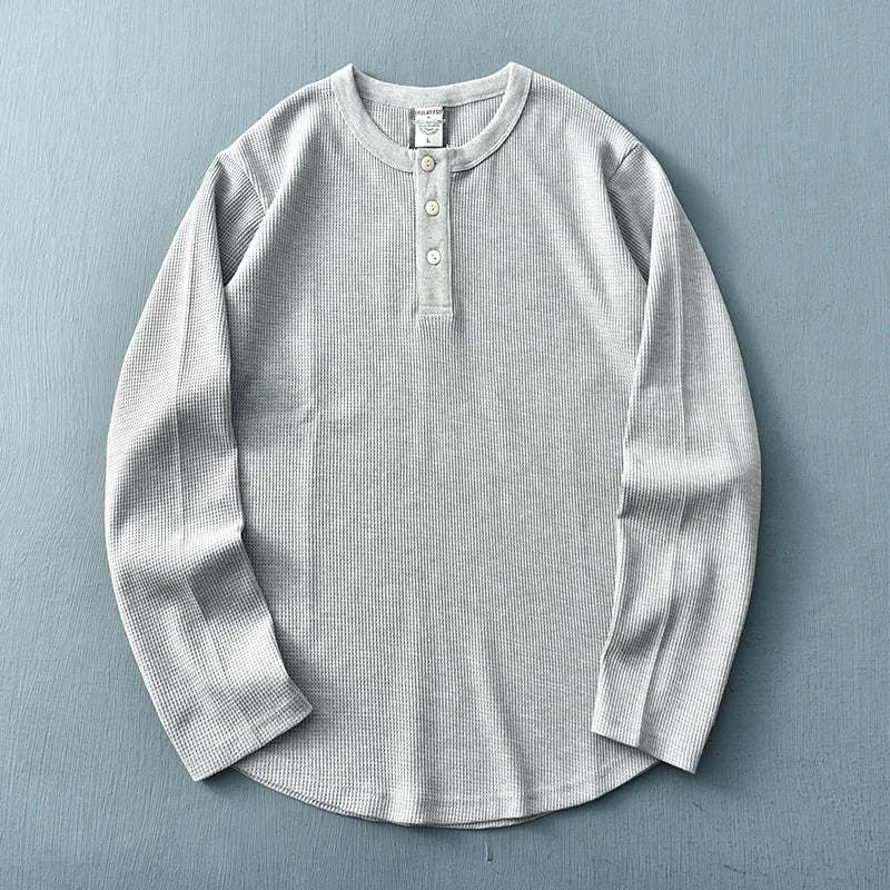 Elegant heren Henley T-shirt met lange mouwen, casual kleding voor een verfijnde stijl.