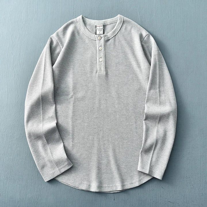 Elegant heren Henley T-shirt met lange mouwen, casual kleding voor een verfijnde stijl.