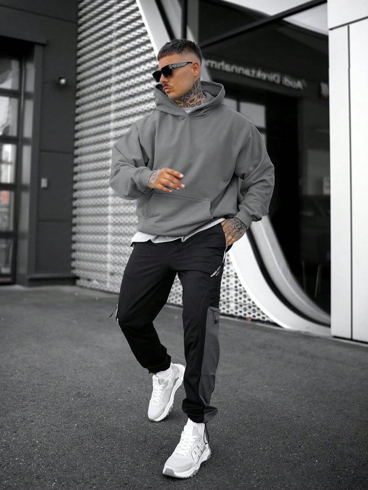 Effen oversized heren hoodie met capuchon, moderne streetwear look, ultiem comfort voor elke dag.