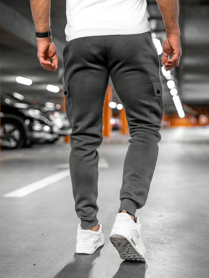 Zwarte stretch heren cropped joggingbroek, maximaal comfort. Ideale sportbroek voor training.