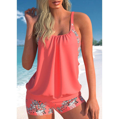 "Trendy Thea tankini badpak in twee delen, flatterende pasvorm, geschikt voor strand en zwembad, in modieuze kleuren."
