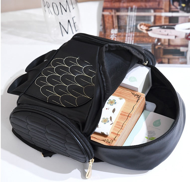 Praktische PU leren schooltas voor dames met uilprint, ruim hoofdcompartiment en comfortabel draagcomfort.