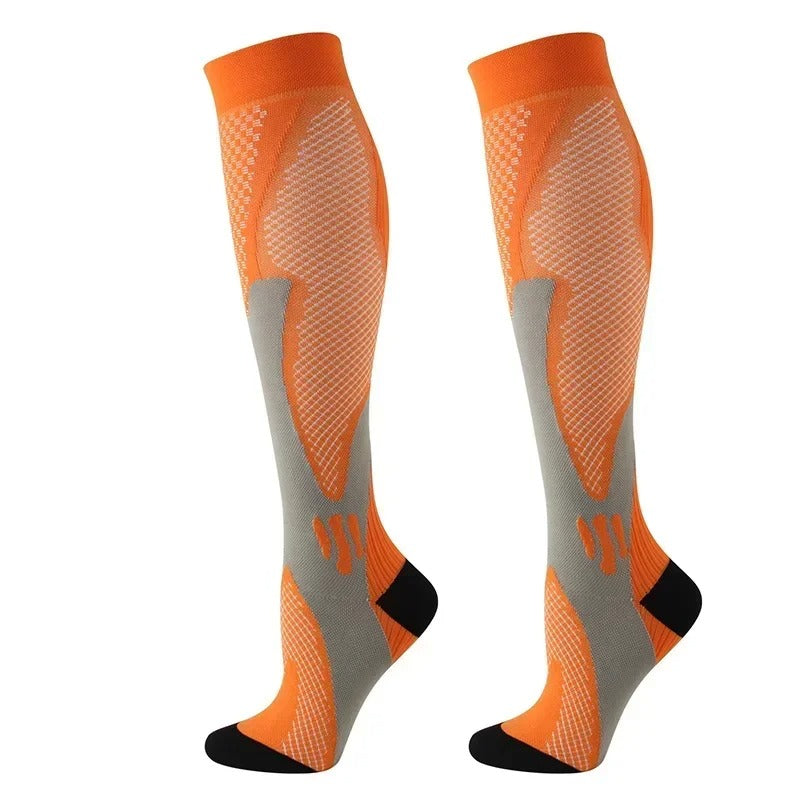 Uniseks compressiekousen voor optimale ondersteuning en comfort; ideaal tegen vermoeide benen en zwelling.
